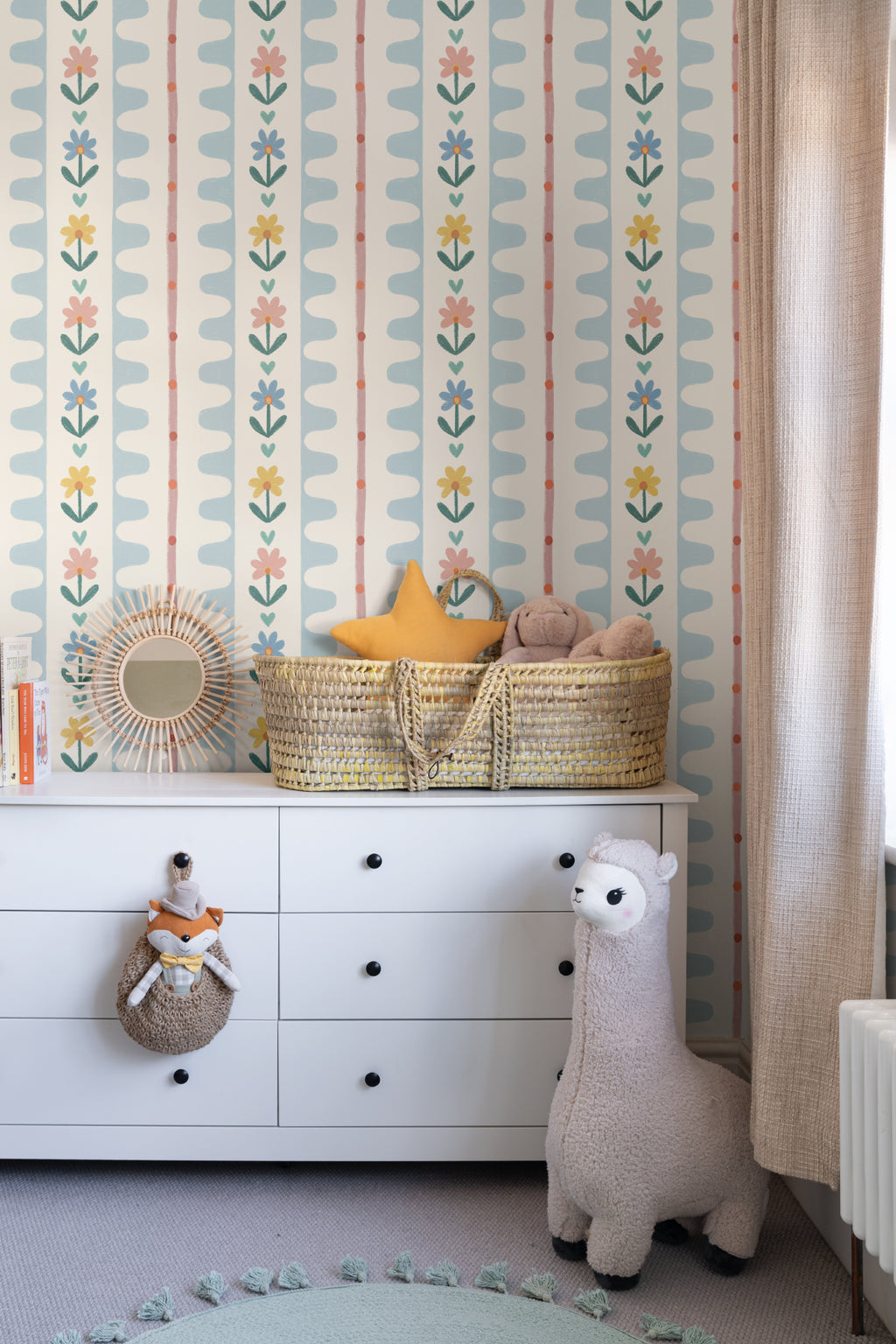 The Folk Garland mural in sky blue and buttercup in a children's room setting