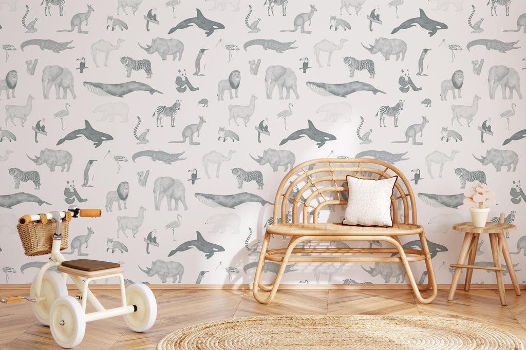 The Gentle Menagerie wallpaper in misty blue in a children's room setting, another angle