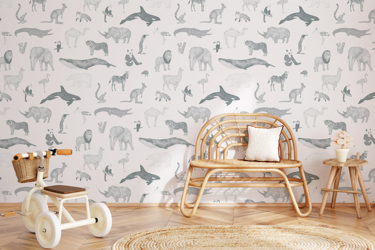 The Gentle Menagerie wallpaper in misty blue in a children's room setting, another angle