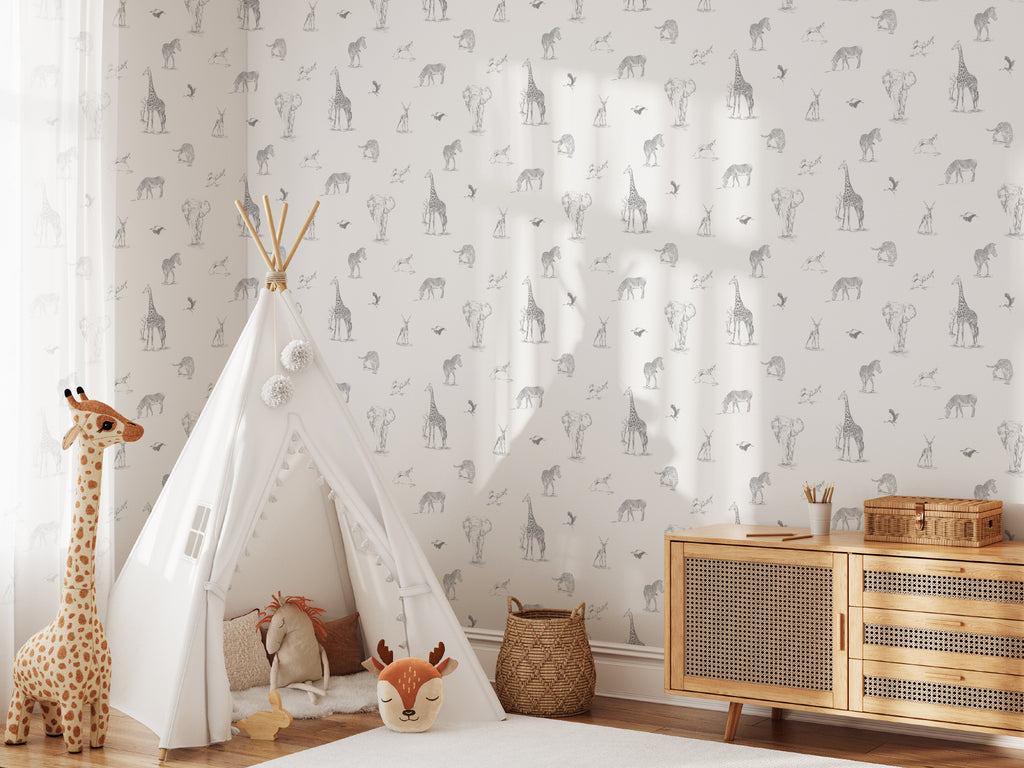 The Grassland Expedition wallpaper in dove grey and white on a nursery wall