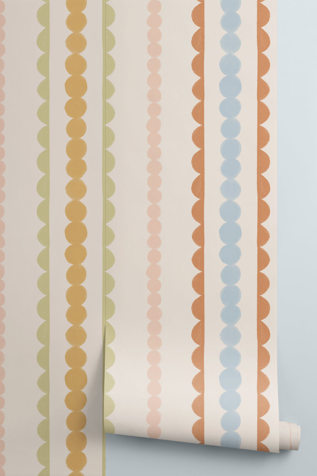Rolled panel of The Haberdashery Braid mural in apricot and pink
