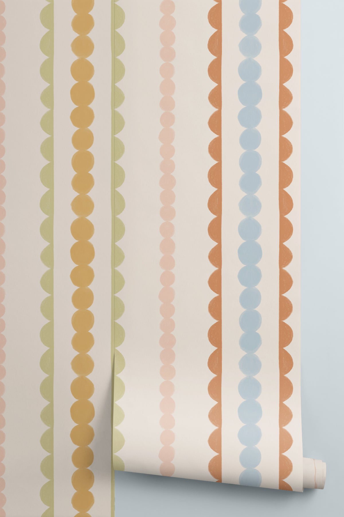 Rolled panel of The Haberdashery Braid mural in apricot and pink