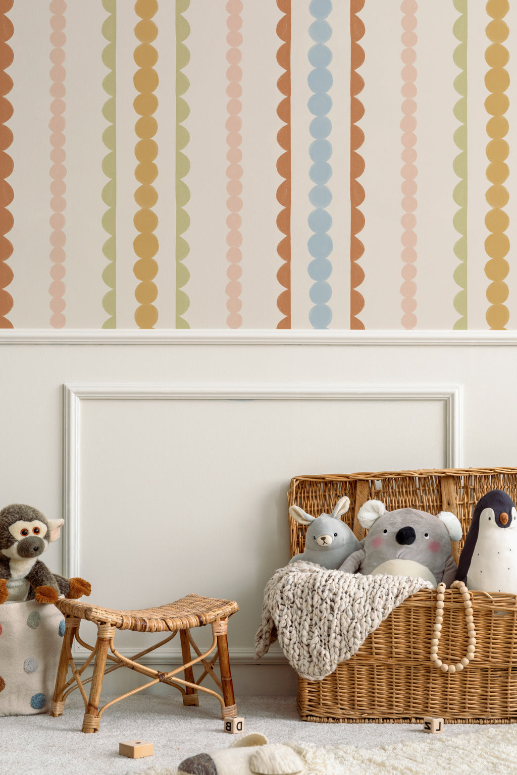 The Haberdashery Braid mural in apricot and pink in a children's room setting, another angle