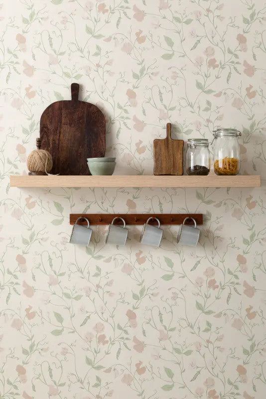 The Heirloom Sprig mural in ivory and sage in a hallway