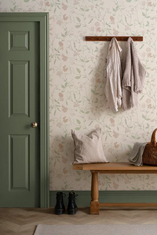 The Heirloom Sprig mural in ivory and sage in an entryway
