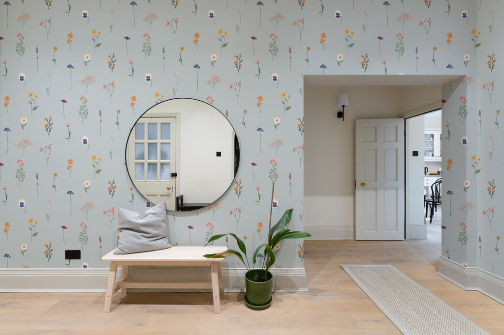 The Herbarium Press wallpaper in mist blue in a styled room, another view