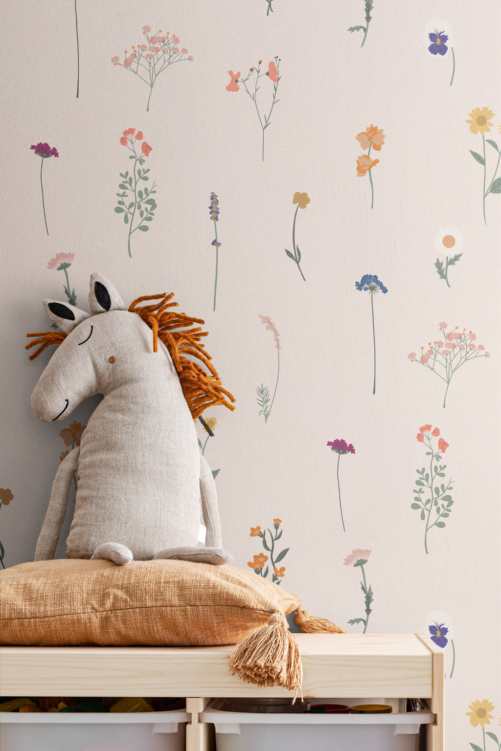 The Herbarium Press wallpaper in soft blush on a nursery wall