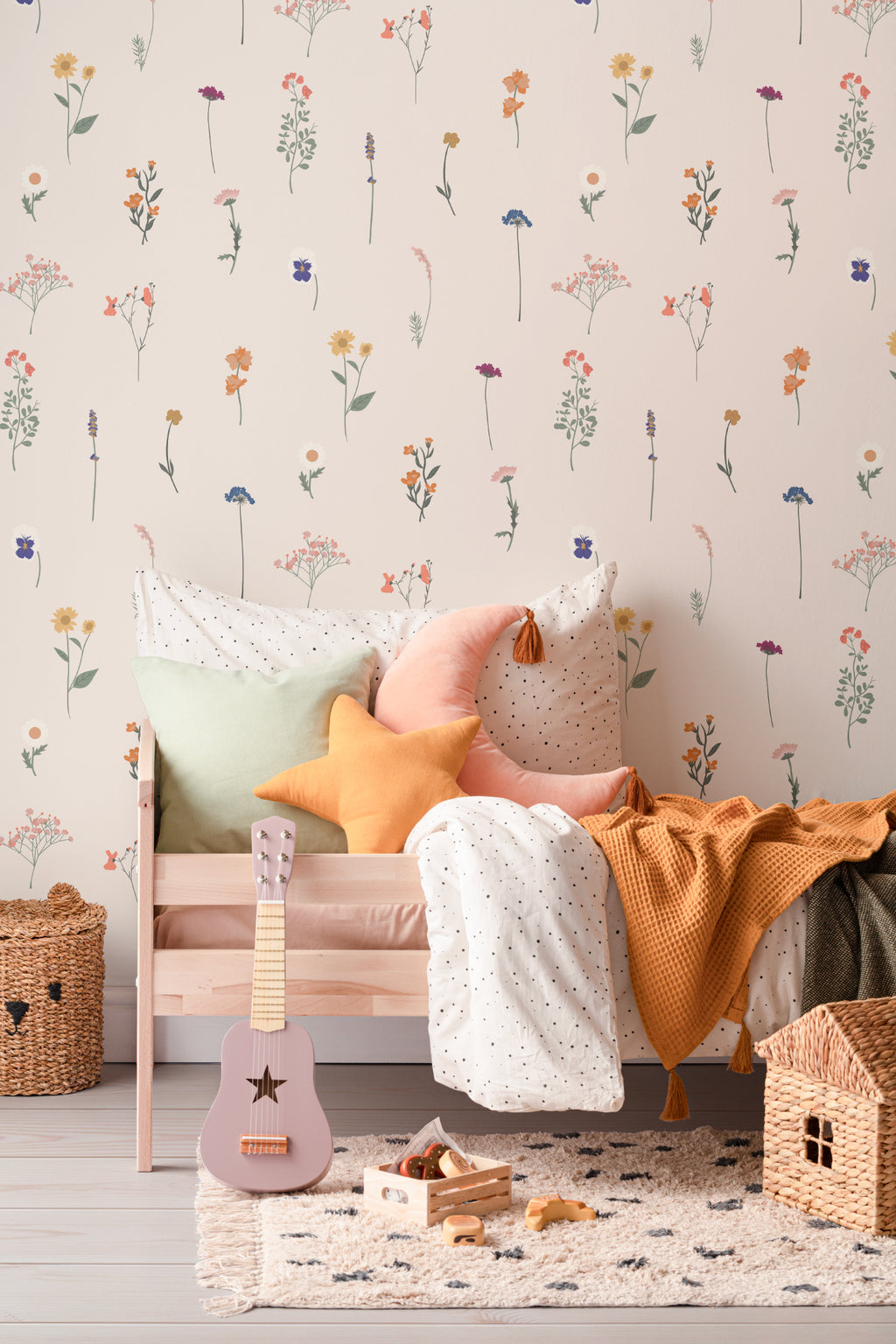 The Herbarium Press wallpaper in soft blush in a child's bedroom