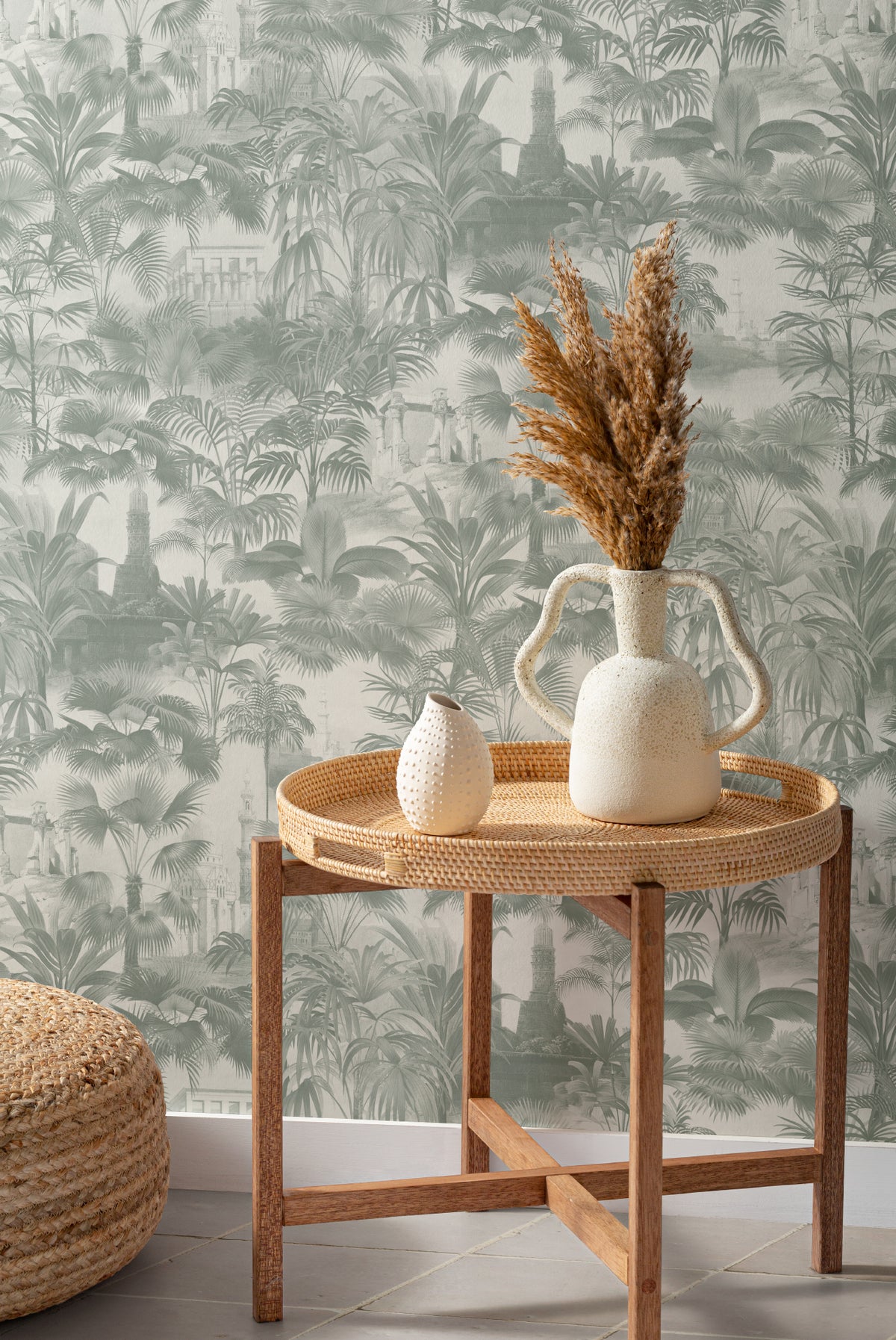 The Hidden Pavilion wallpaper in eucalyptus green behind a styled console