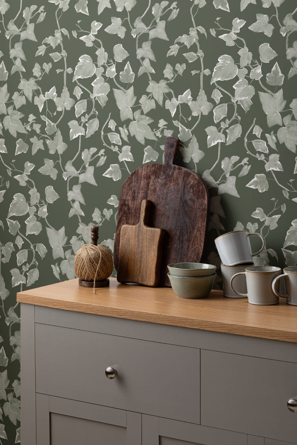 The Ivy Rectory wallpaper in forest green in a kitchen