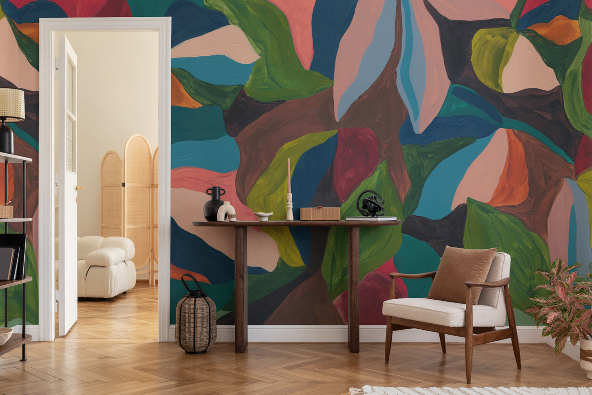 The Jewel Foliage mural in teal and coral in a study corner with a desk