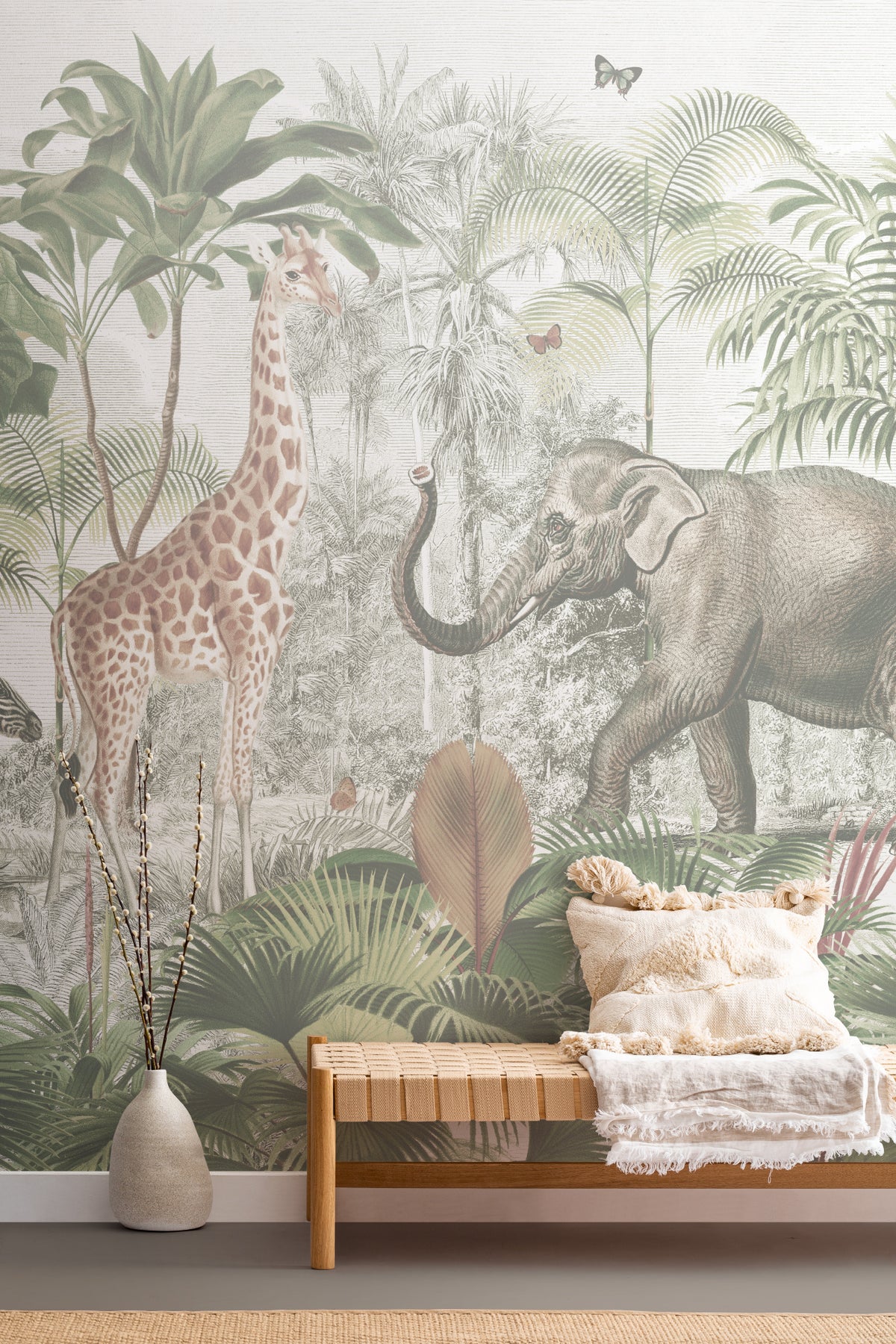 The Jungle Caravan mural in jungle green on a nursery wall