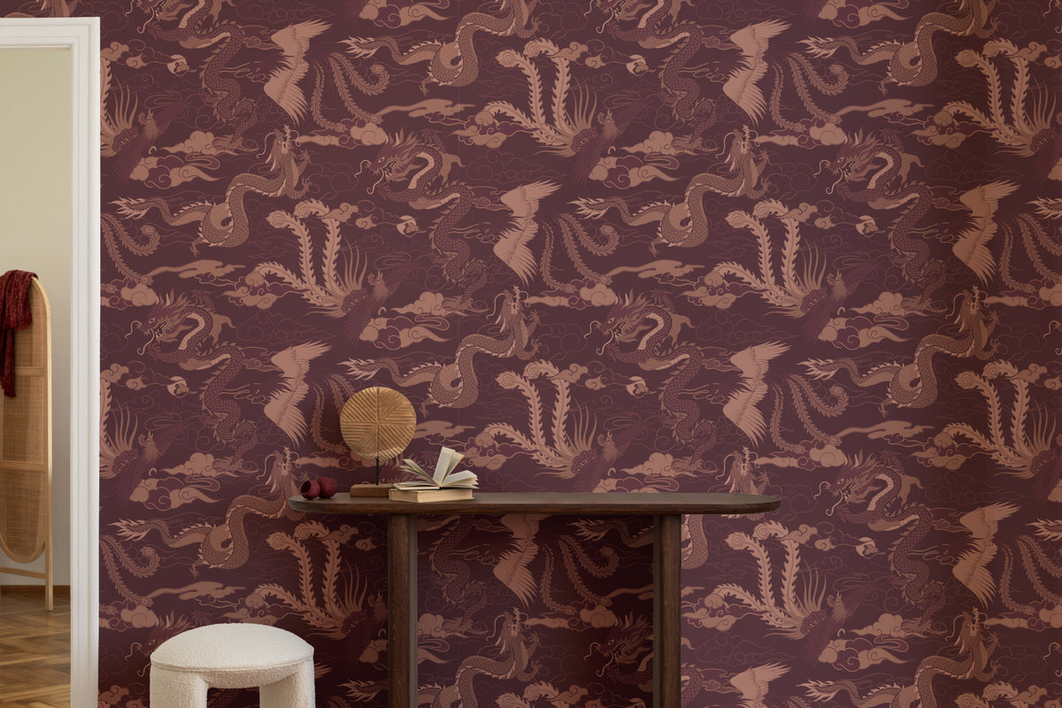 The Lacquer Palace wallpaper in oxblood and rose behind a desk in a home office