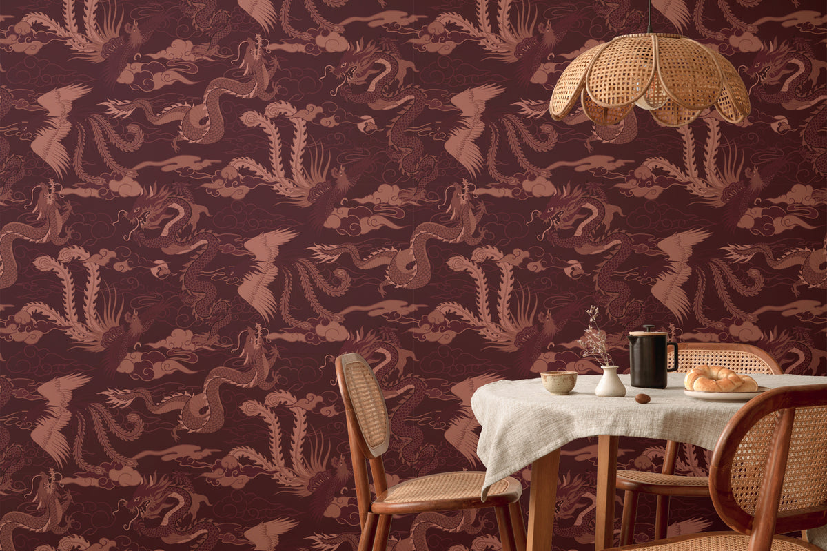 The Lacquer Palace wallpaper in oxblood and rose behind a dining table