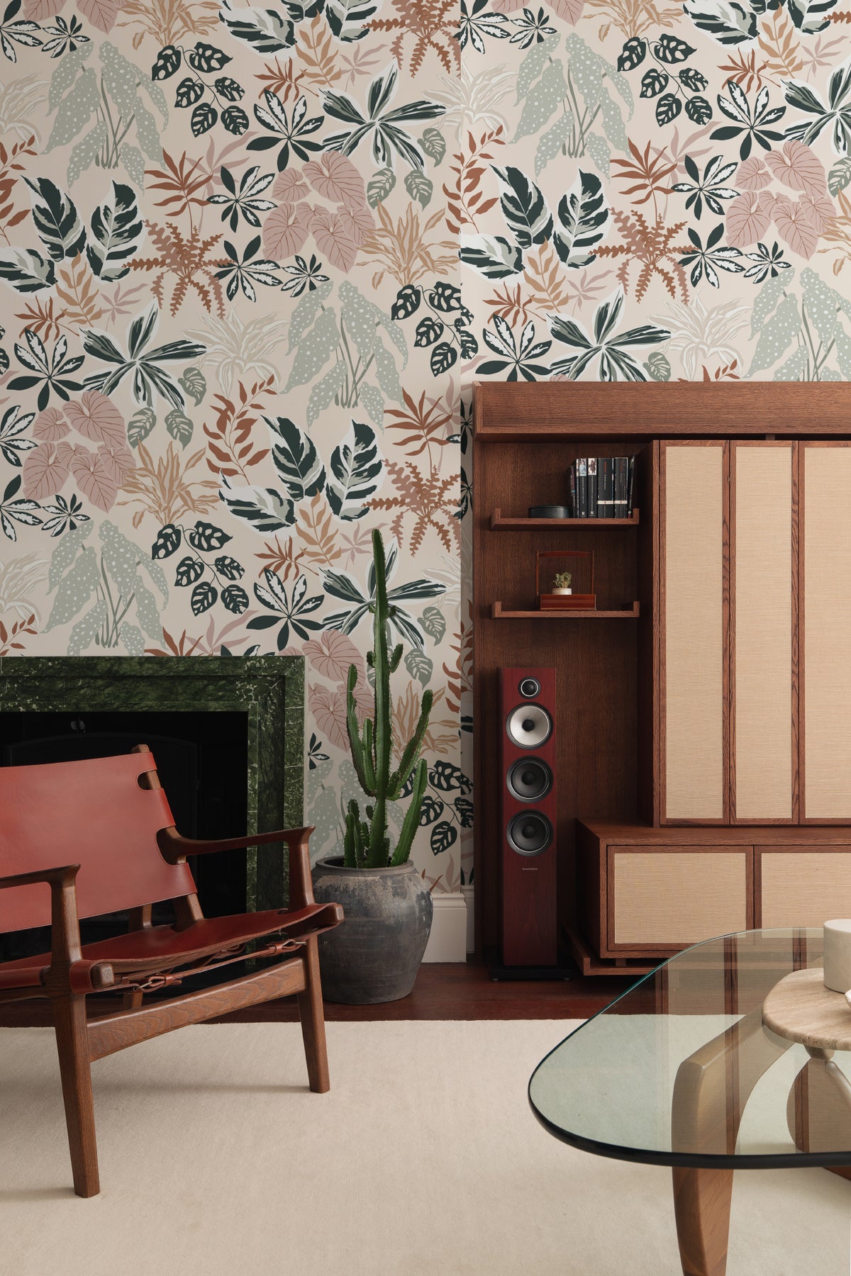 The Leafy Solarium wallpaper in warm sand and pine in a living room
