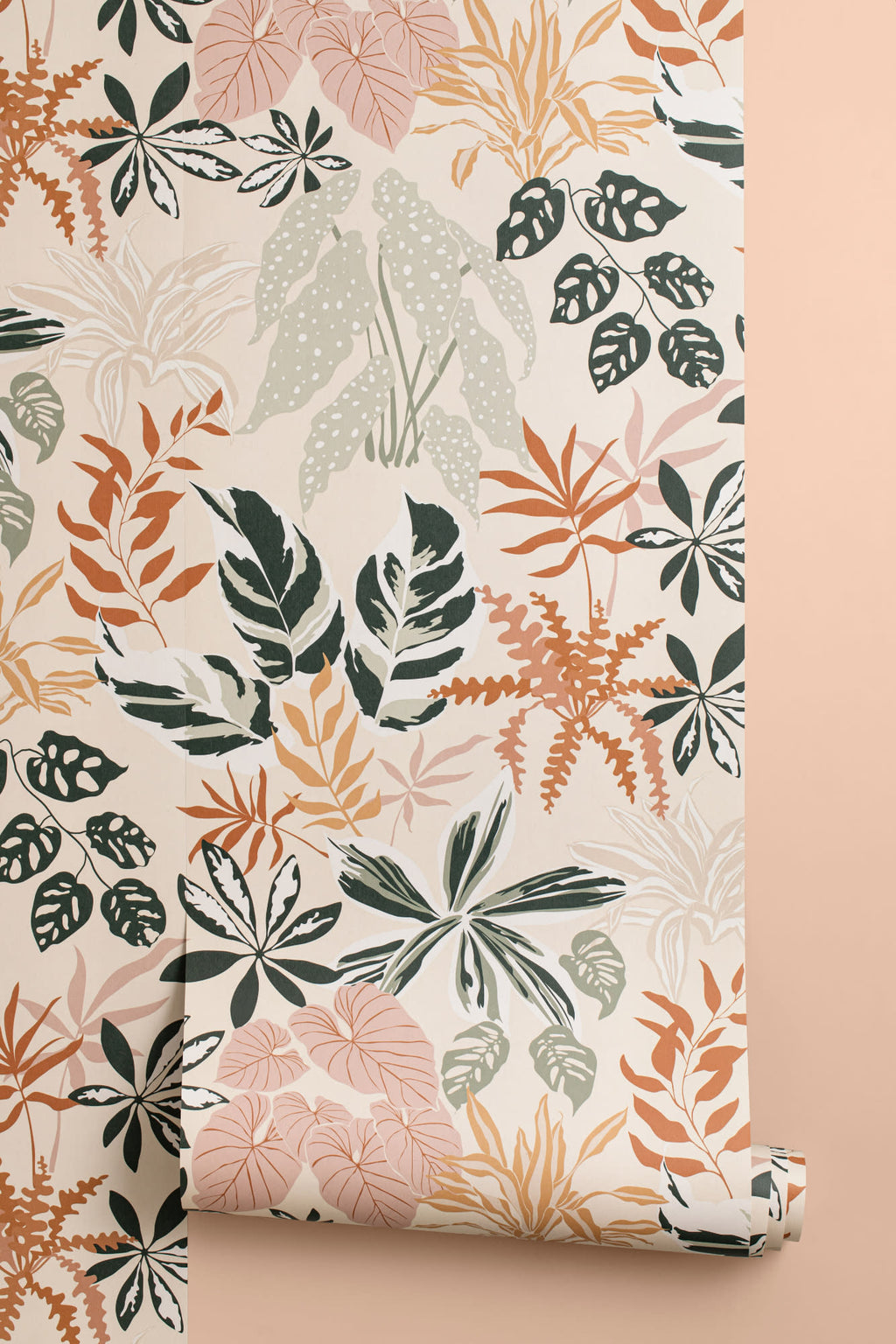 Roll of The Leafy Solarium wallpaper in warm sand and pine, another angle