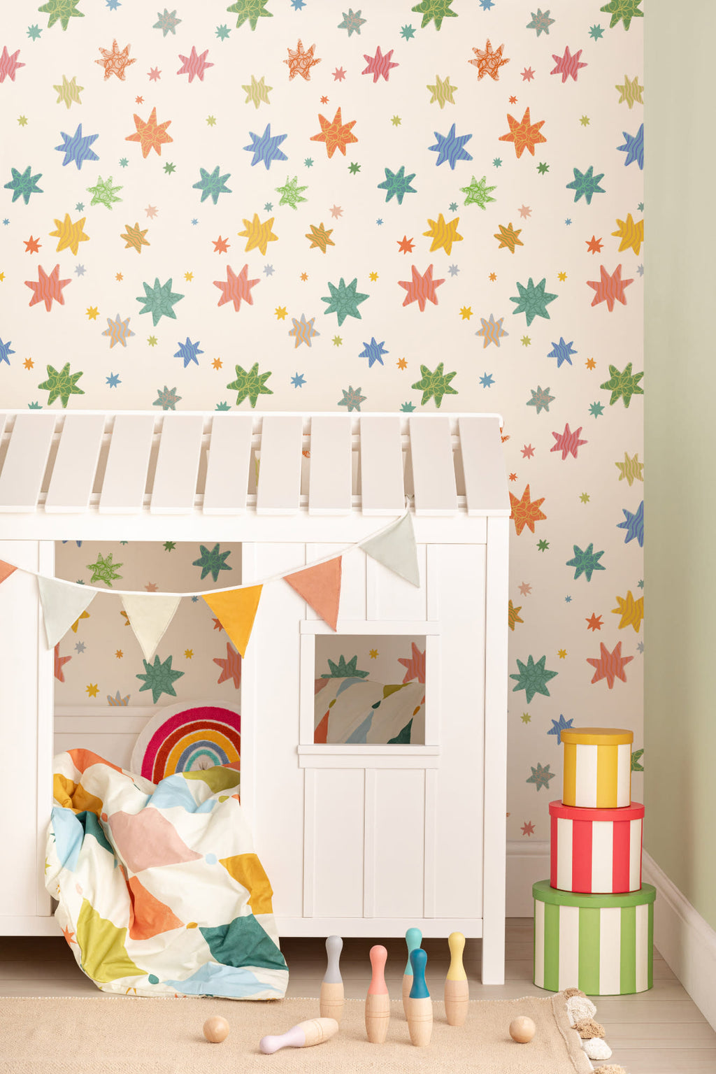The Little Constellation wallpaper in soft white in a child's bedroom
