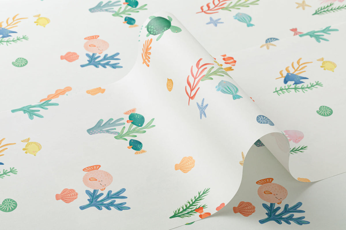 Roll of The Little Rockpool wallpaper in coral and seafoam