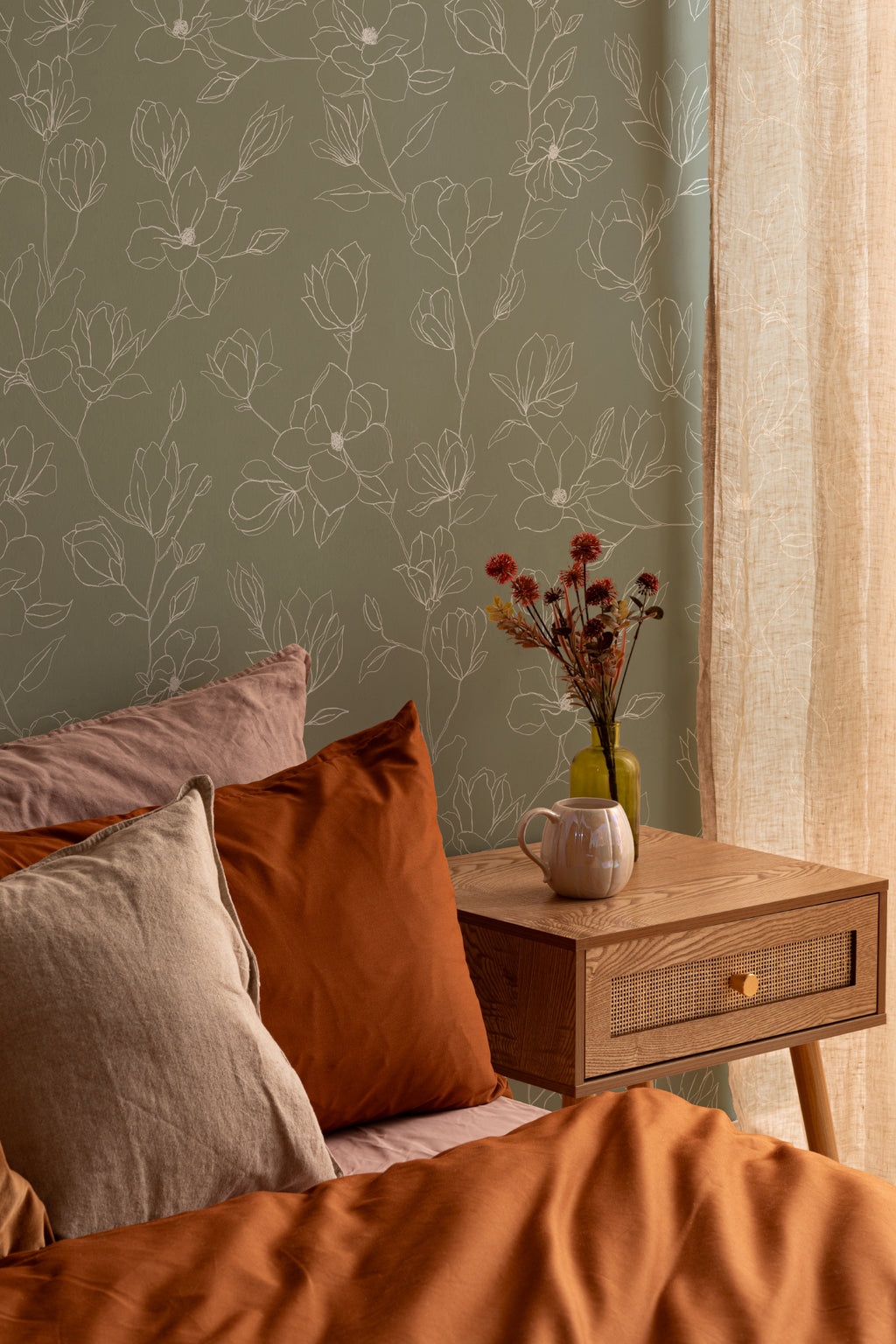 The Magnolia Sketchbook wallpaper in olive sage in a living room