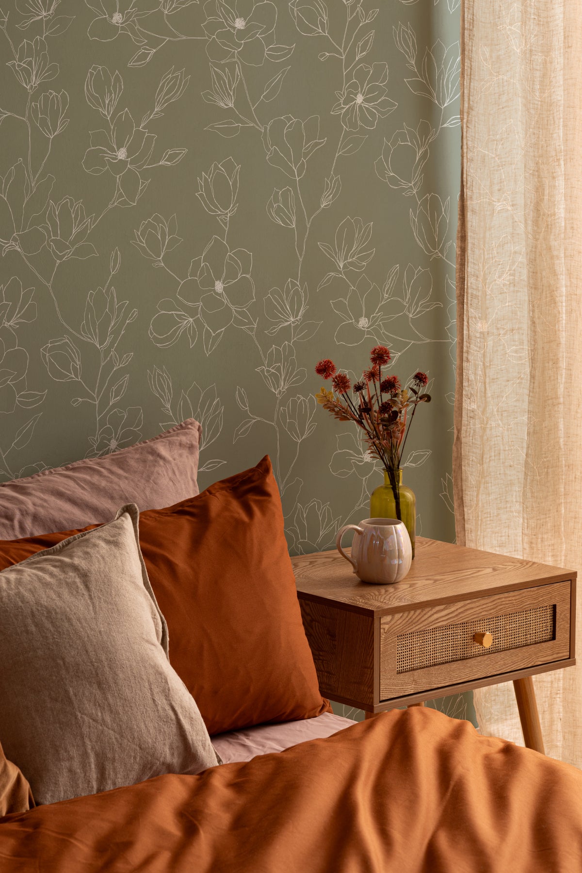 The Magnolia Sketchbook wallpaper in olive sage in a living room