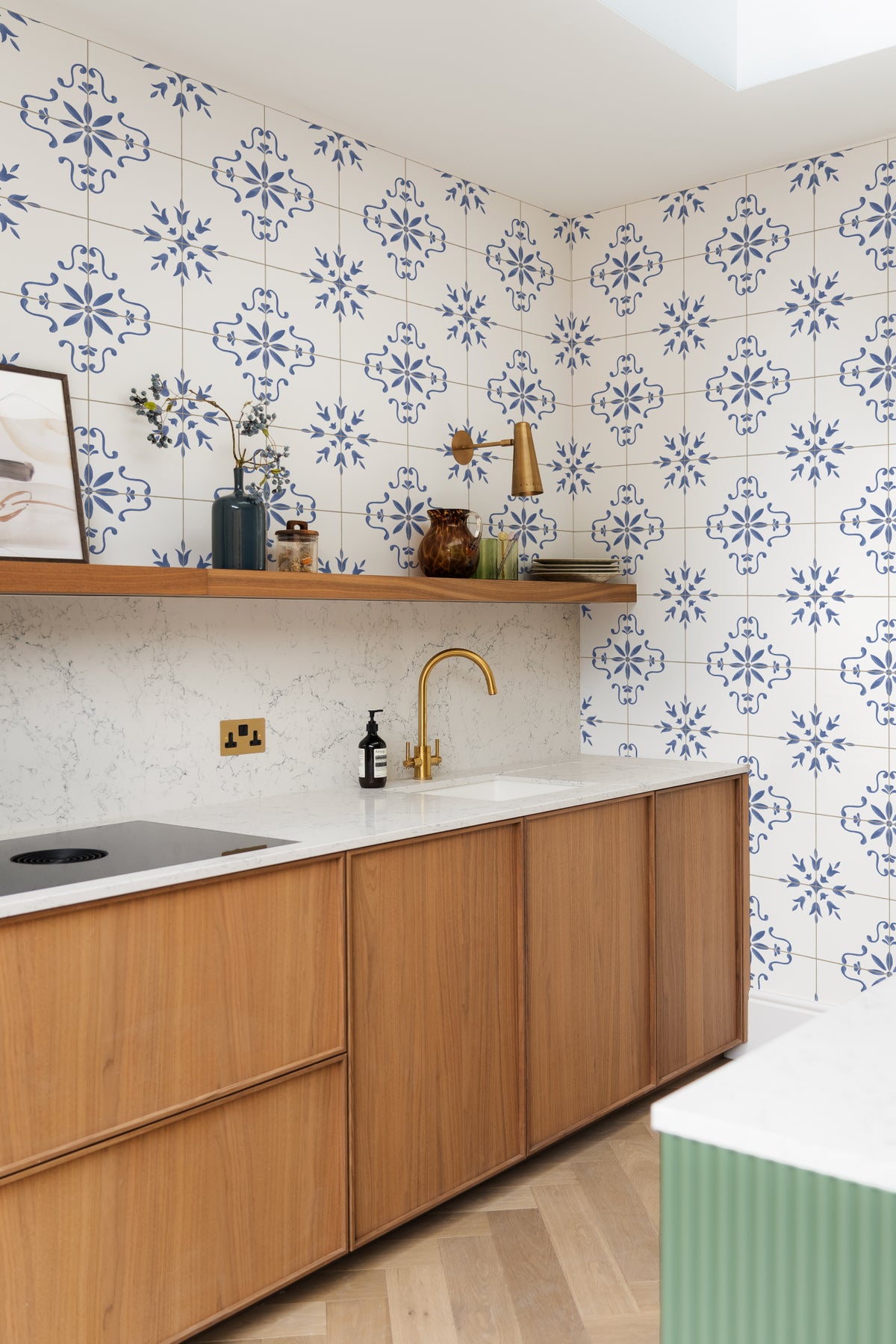 The Majolica Tile mural in cobalt and white in a kitchen