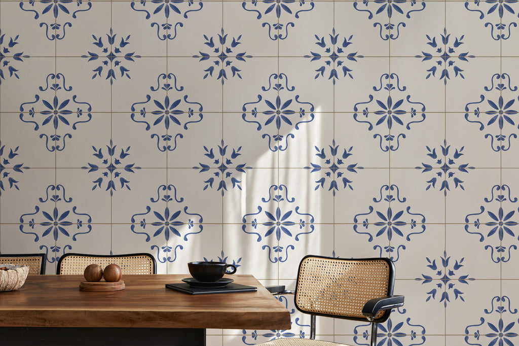 The Majolica Tile mural in cobalt and white behind a dining table