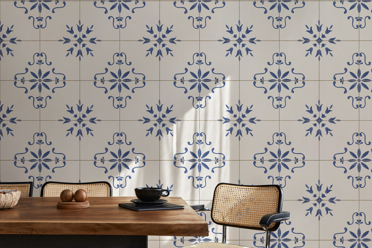 The Majolica Tile mural in cobalt and white behind a dining table
