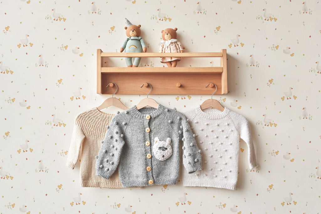 The Mallard Meadow wallpaper in buttermilk and beige in a child's bedroom