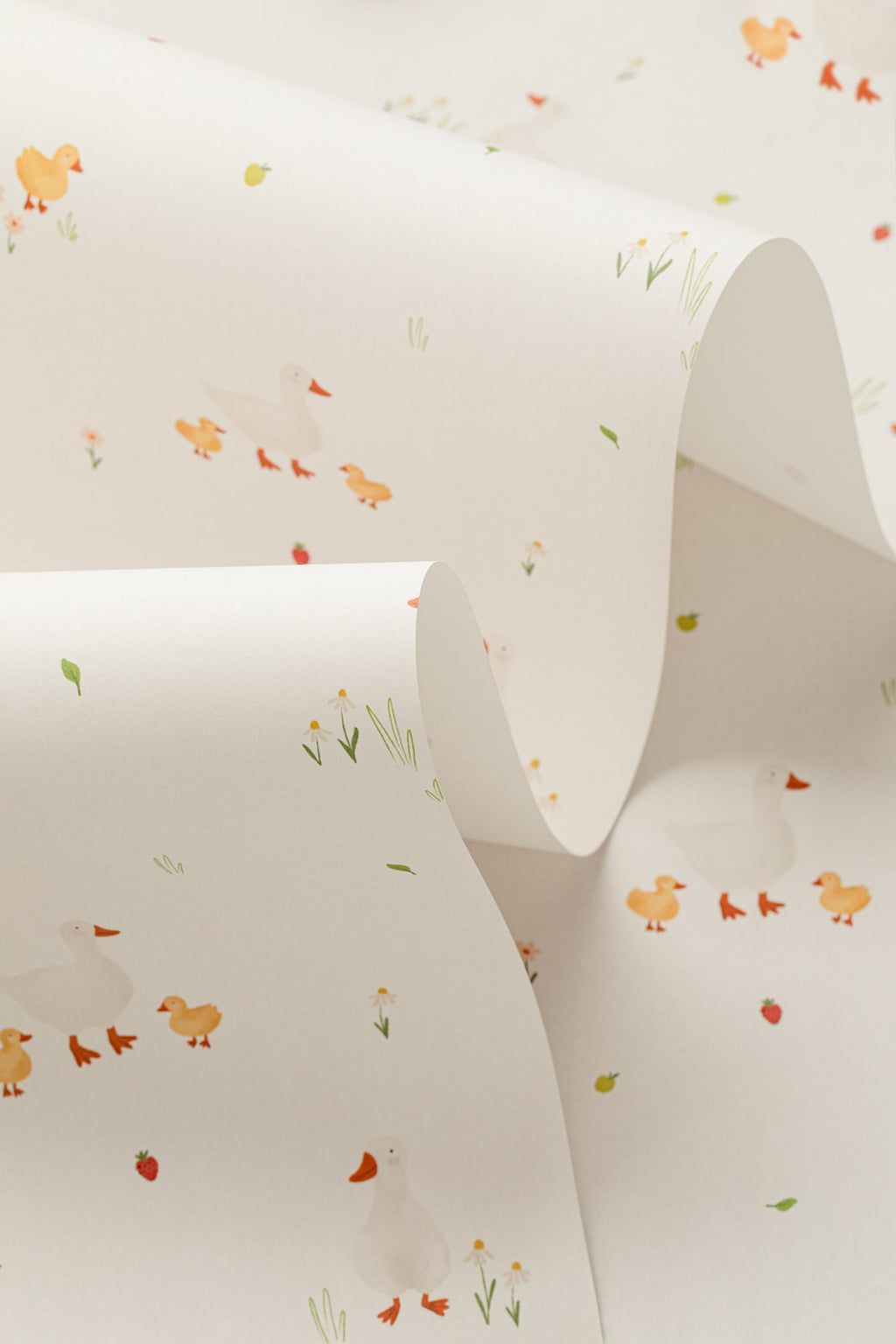 Angled detail of The Mallard Meadow wallpaper in buttermilk and beige