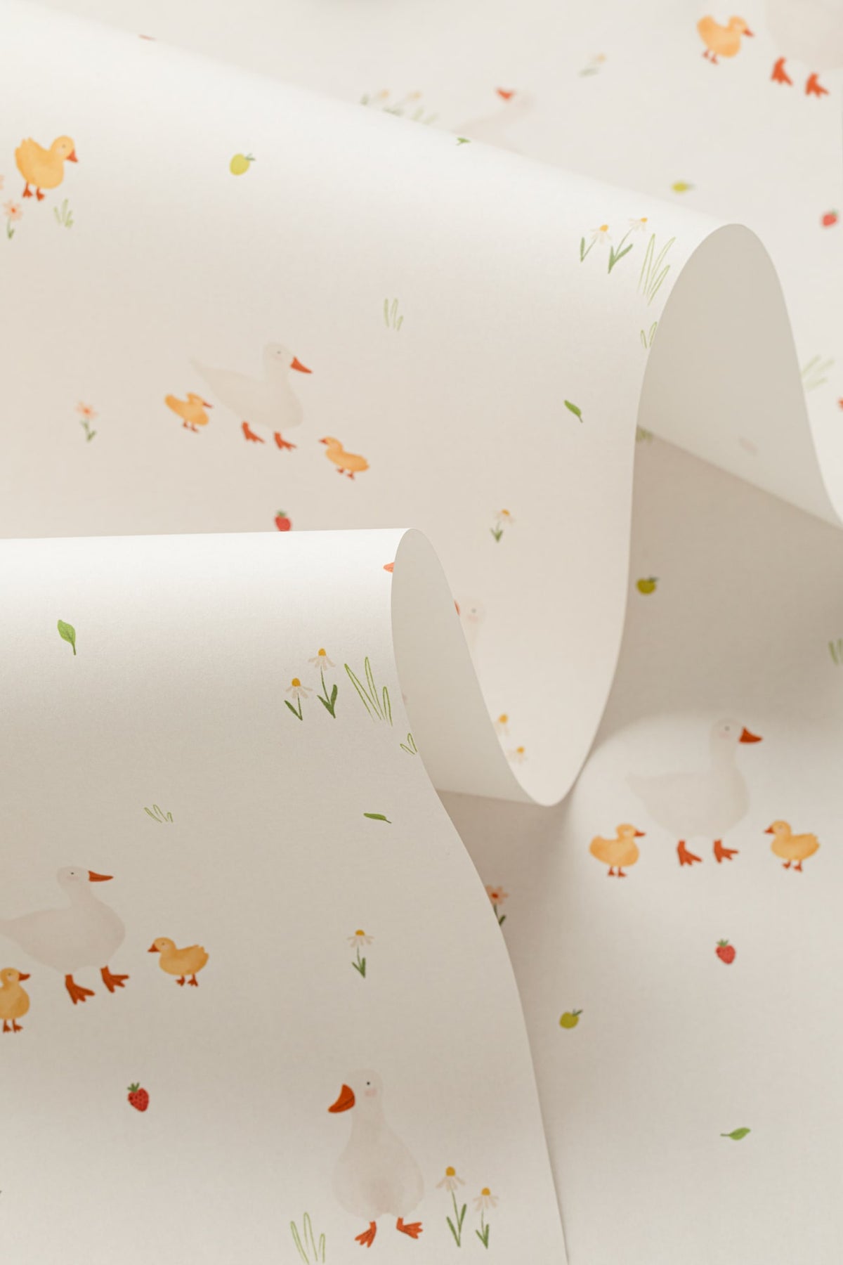 Angled detail of The Mallard Meadow wallpaper in buttermilk and beige