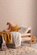 The Mallard Meadow wallpaper in shell pink in a living room