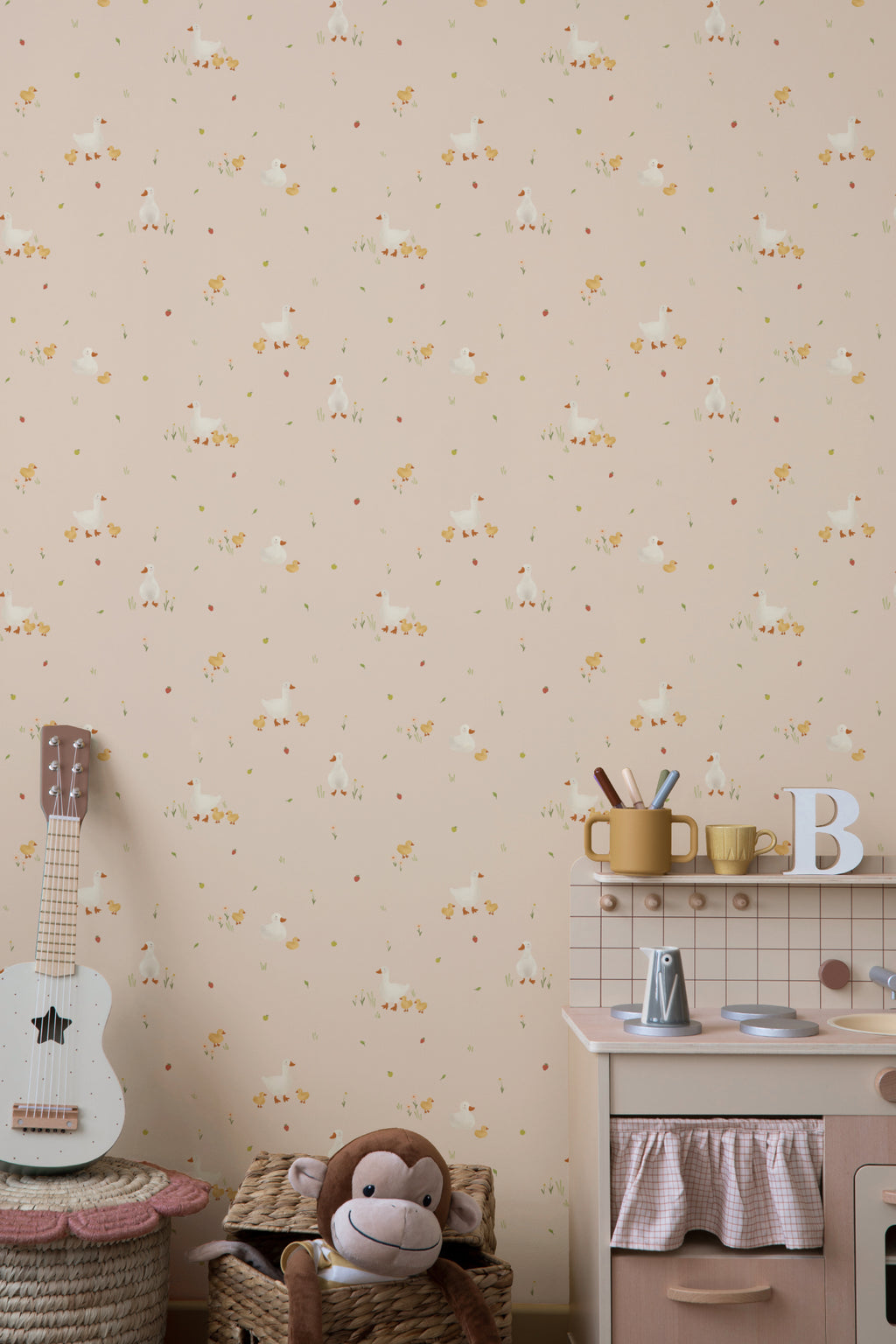 The Mallard Meadow wallpaper in shell pink in a child's bedroom
