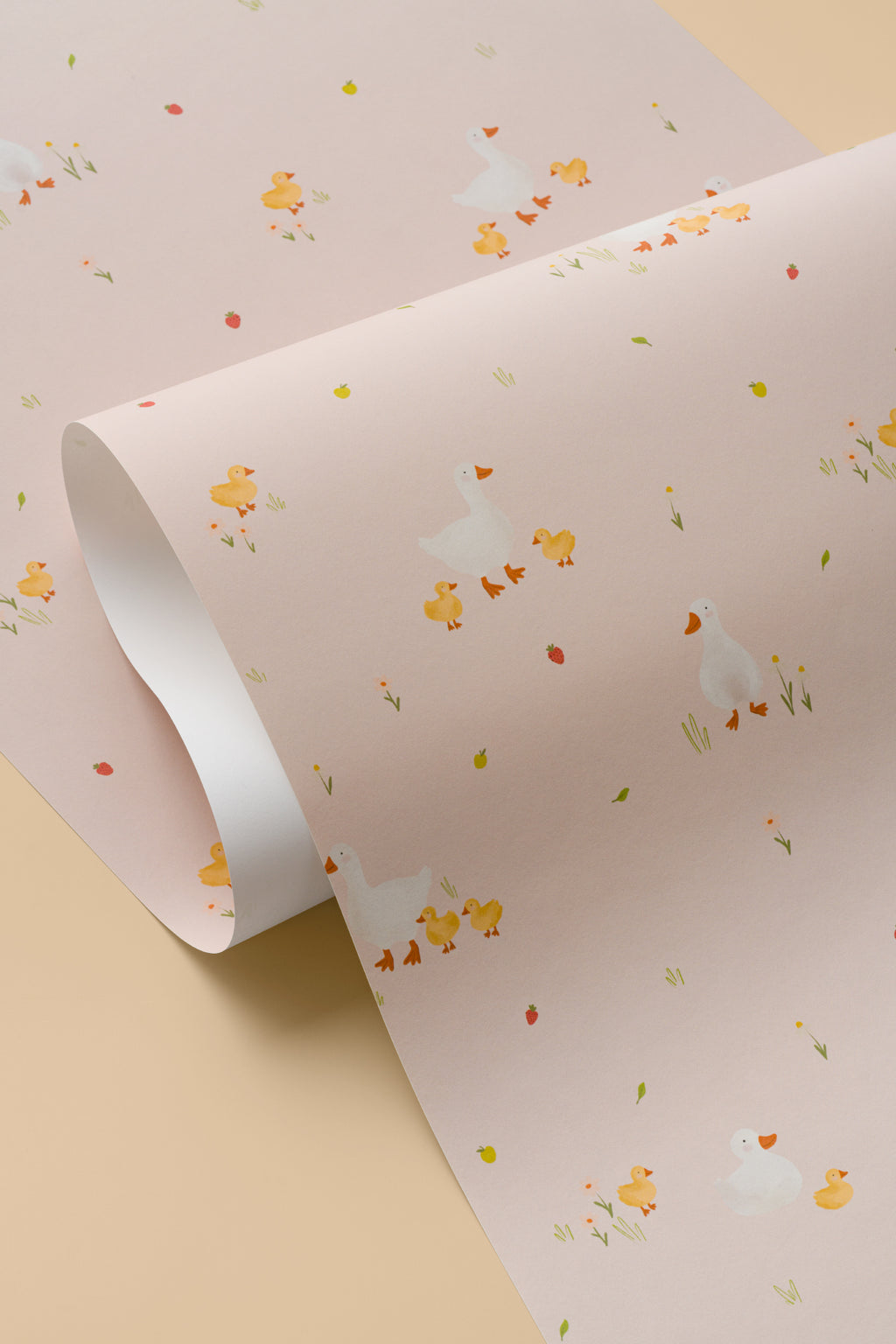 Angled detail of The Mallard Meadow wallpaper in shell pink