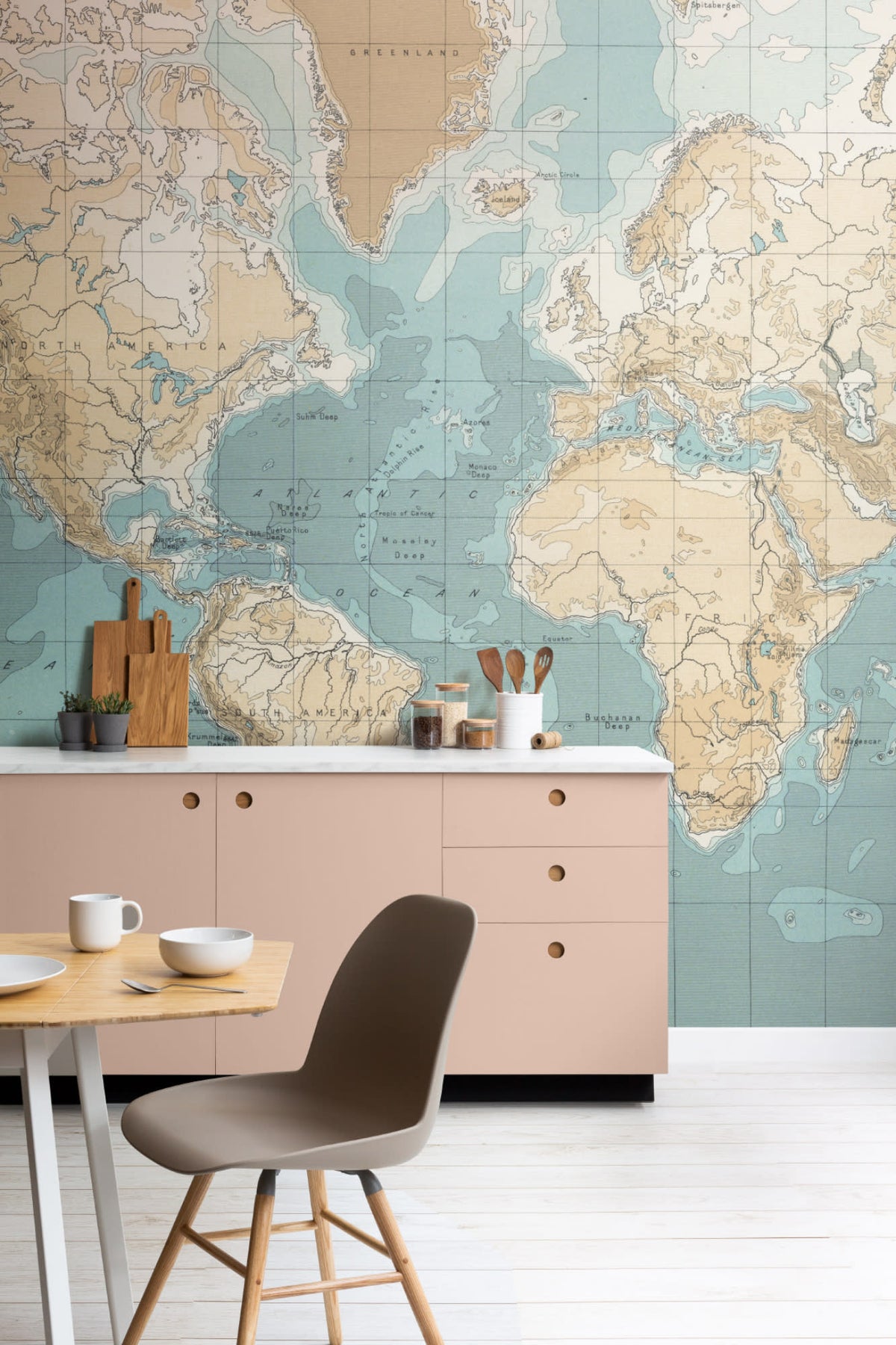 The Mariner Chart mural in sea blue and parchment behind a desk in a home office