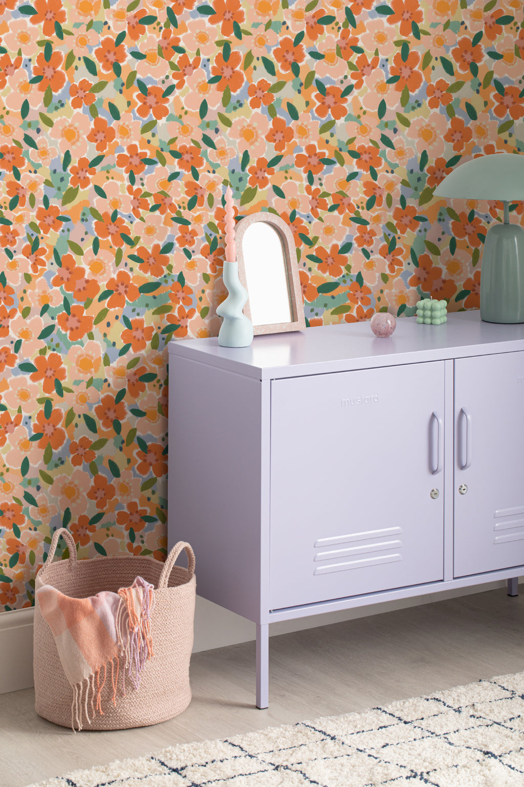The Marmalade Bloom wallpaper in tangerine and blush in a child's bedroom