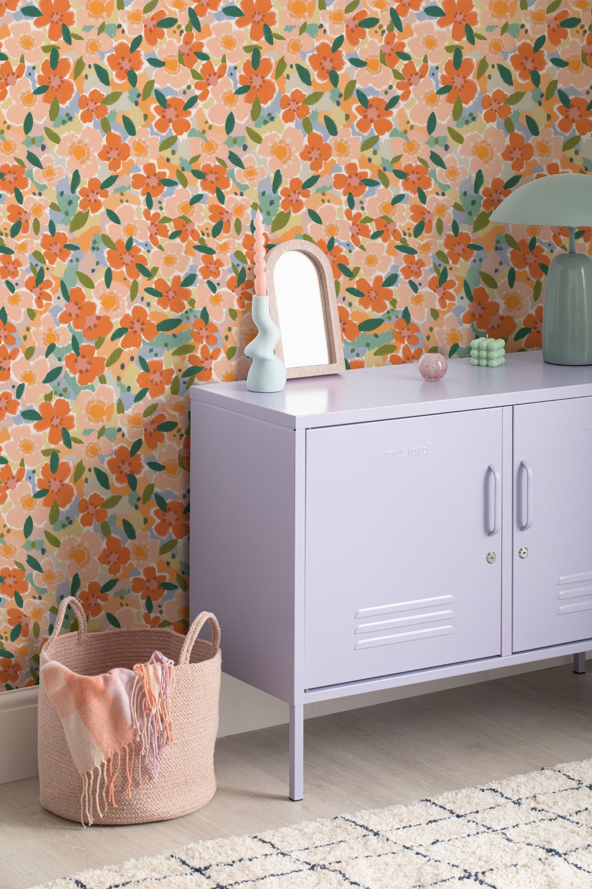 The Marmalade Bloom wallpaper in tangerine and blush in a child's bedroom