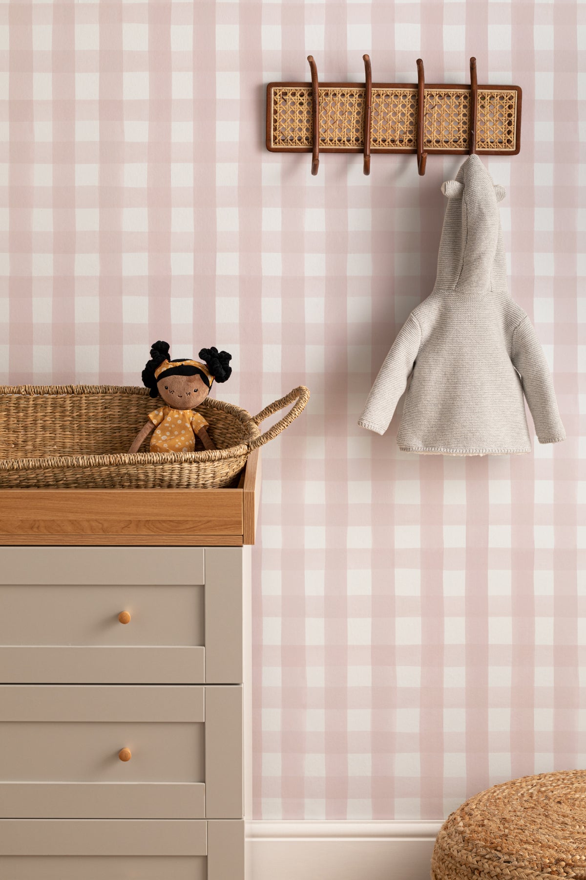 The Meadow Gingham wallpaper in ballet pink on a nursery wall