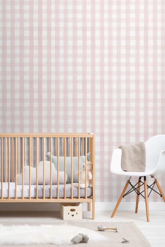 The Meadow Gingham wallpaper in ballet pink behind a kids' play corner