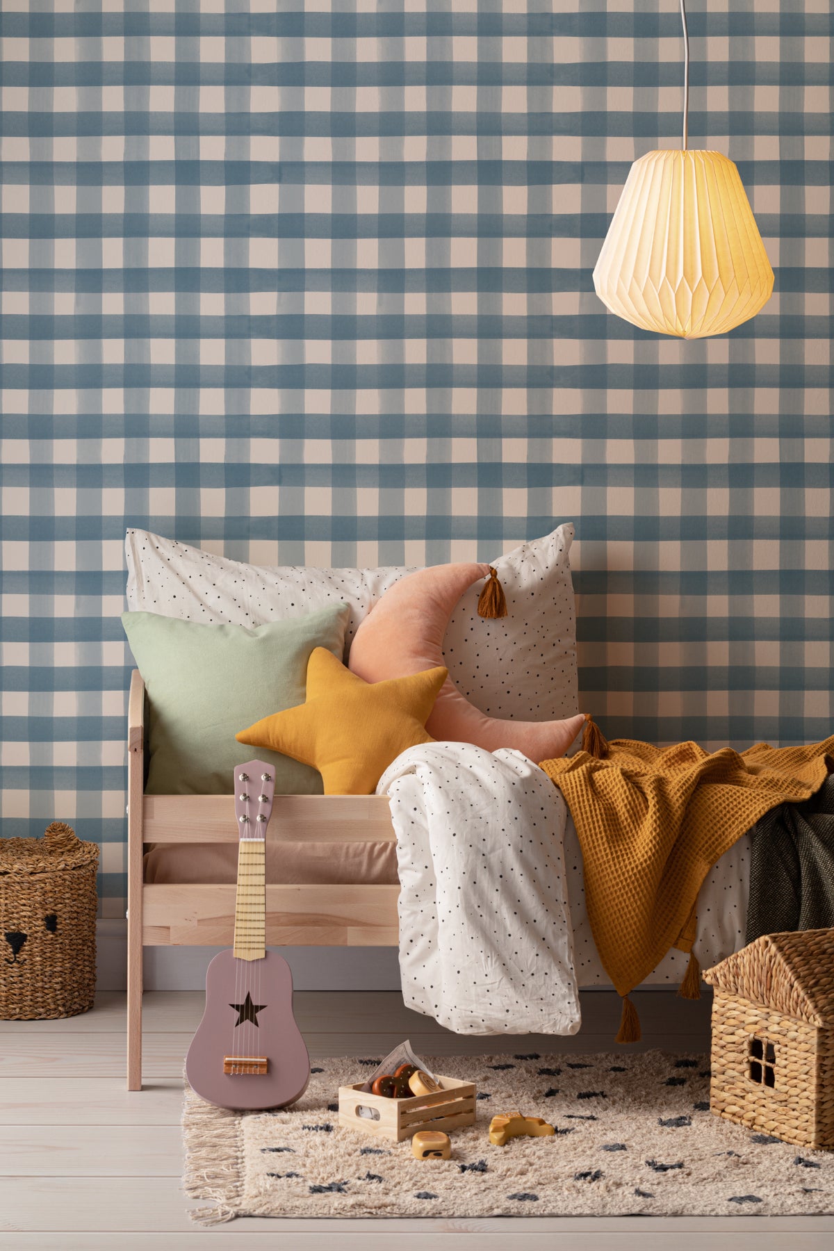 The Meadow Gingham wallpaper in navy and chambray in a child's bedroom
