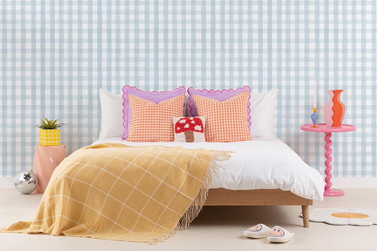 The Meadow Gingham wallpaper in powder blue in a child's bedroom