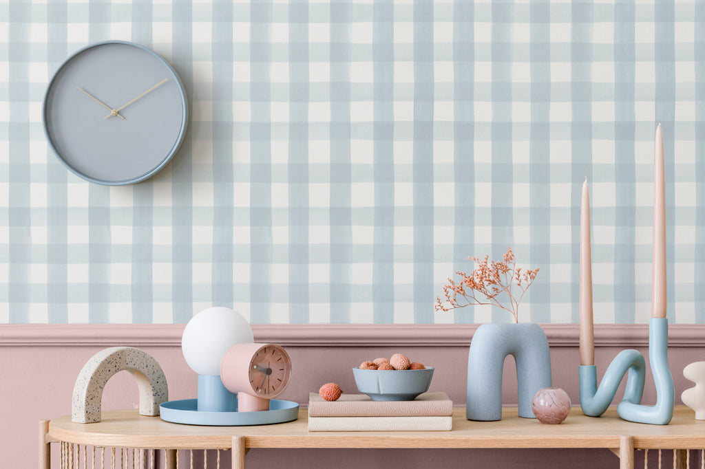 The Meadow Gingham wallpaper in powder blue behind a kids' play corner