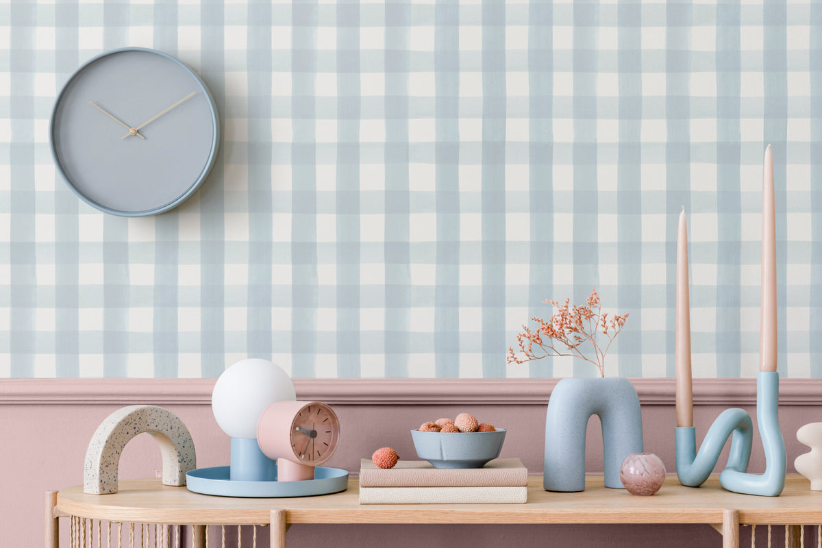 The Meadow Gingham wallpaper in powder blue behind a kids' play corner