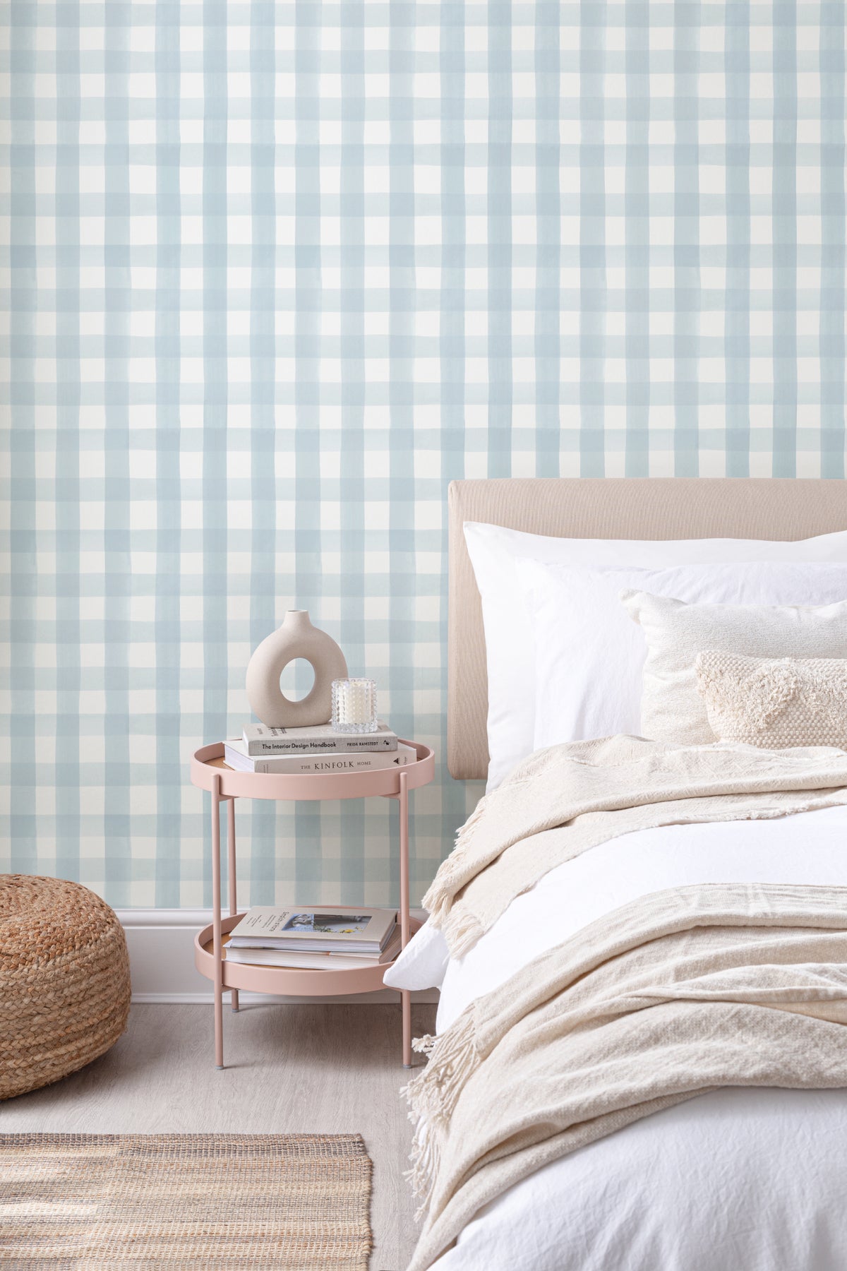 The Meadow Gingham wallpaper in powder blue behind the bed in a bedroom