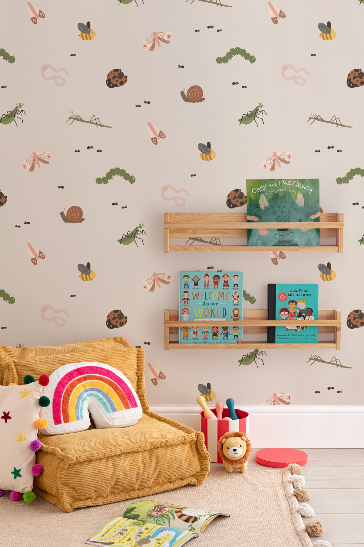 The Minibeast Garden wallpaper in soft neutral in a child's bedroom