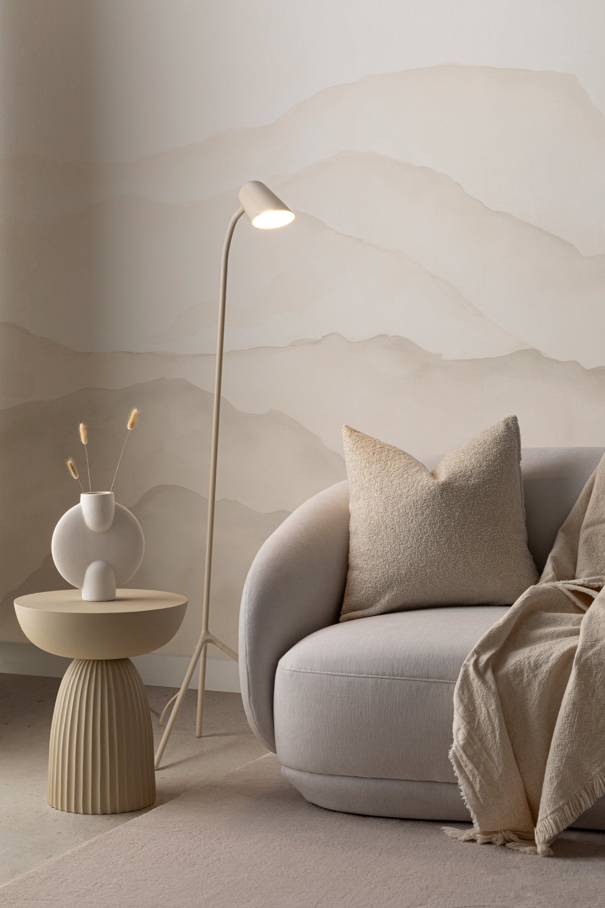 The Misted Ranges mural in sand and cream in a living room