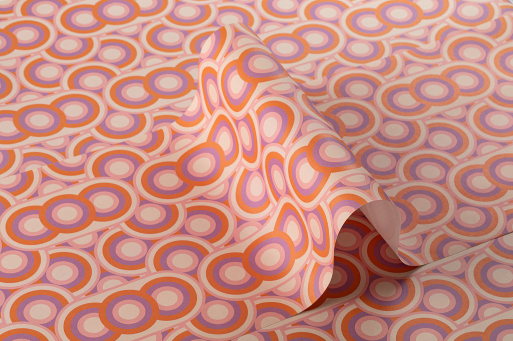 Roll of The Mod Portico wallpaper in tangerine and pink