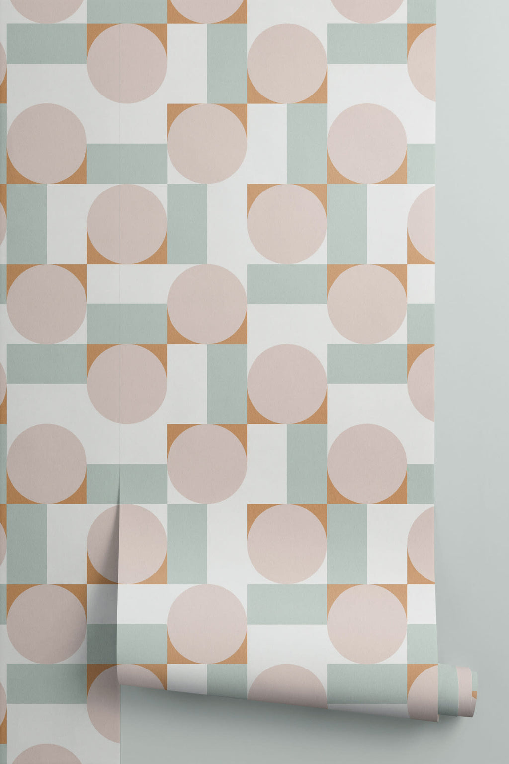Roll of The Modernist Mosaic wallpaper in blush and sage, another angle