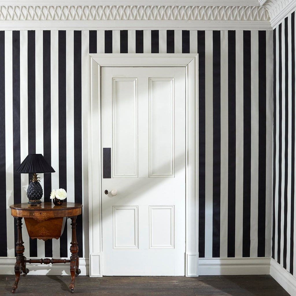 The Mono Lane | Oyster Black Luxe — hung-wall roomshot