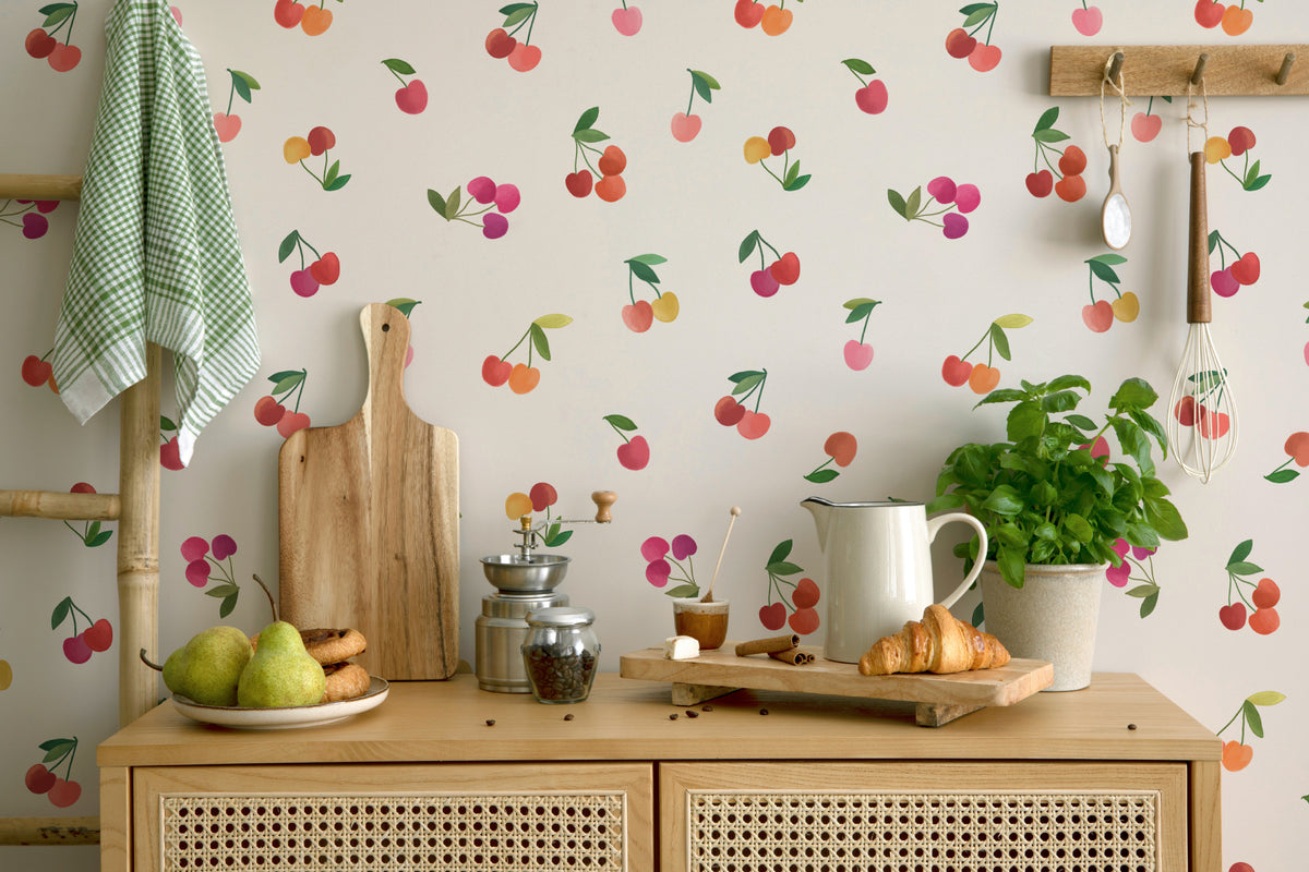 The Morello Orchard wallpaper in cherry red and cream in a kitchen