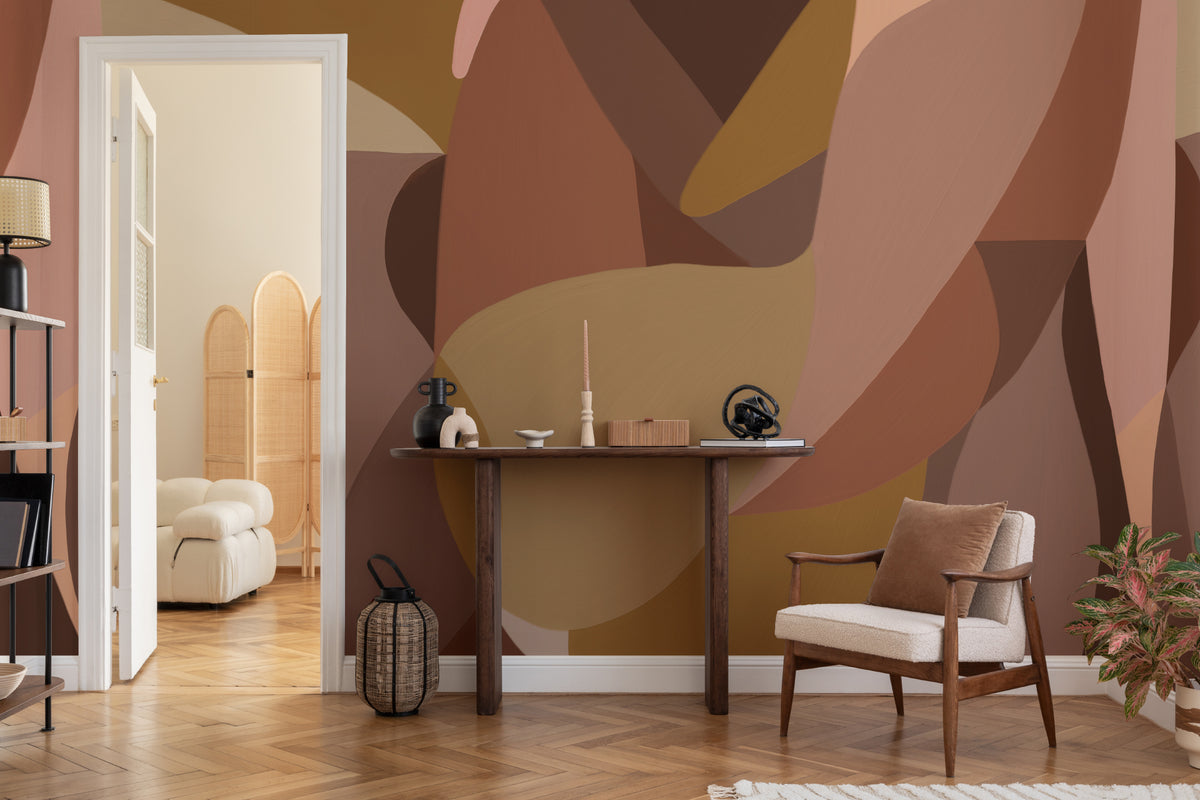 The Muse Silhouette mural in cinnamon and rose behind a desk in a home office